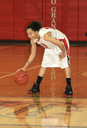 Shardae Morrison-Fountain looks over the defense in Saturday's 74-68 win over St. Catharine.